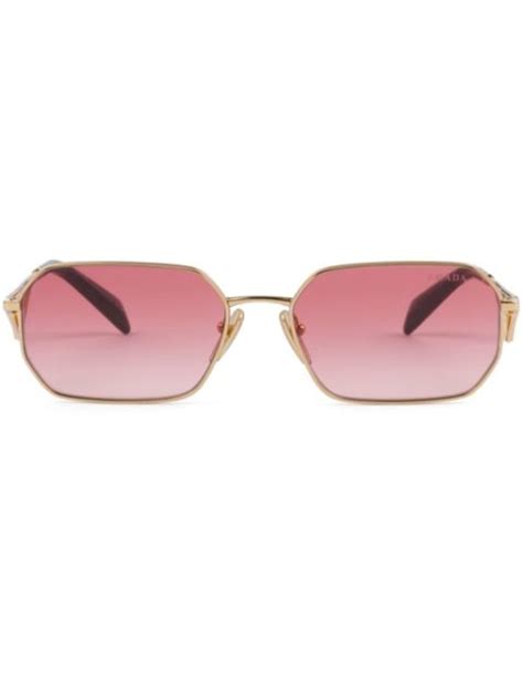 Nuova collezione donna di occhiali Prada Eyewear su FARFETCH